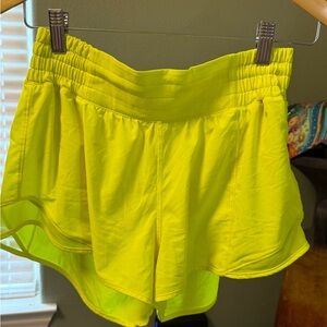 Lululemon Hotty Hot High-Rise Lined Shorts in a bright yellow color